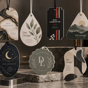 Sju doftetiketter med olika former och mönster, präglade med texten Din Logotyp och Din Design